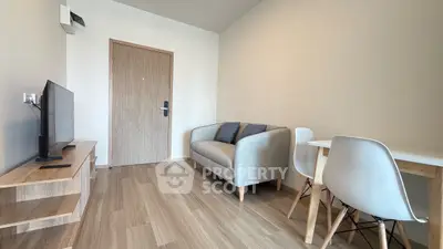 Modern living room with cozy sofa and sleek TV setup