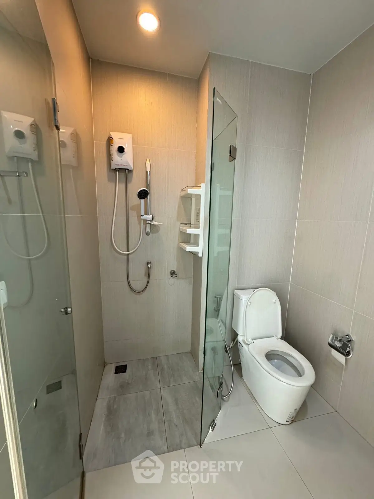 Modern bathroom with glass shower and sleek fixtures