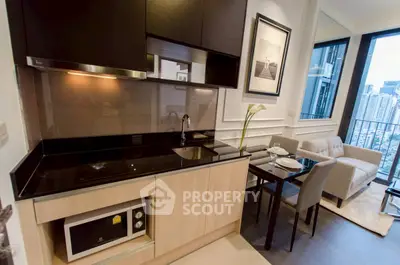 Modern kitchen and living area with city view in luxury apartment