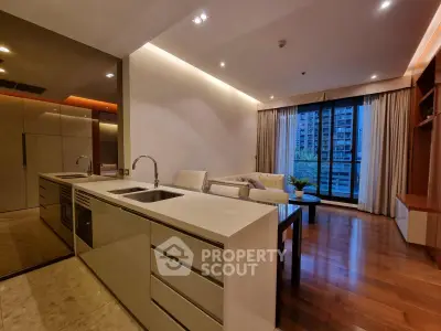 Luxurious modern living room with open kitchen and city view, featuring elegant furnishings and ambient lighting.