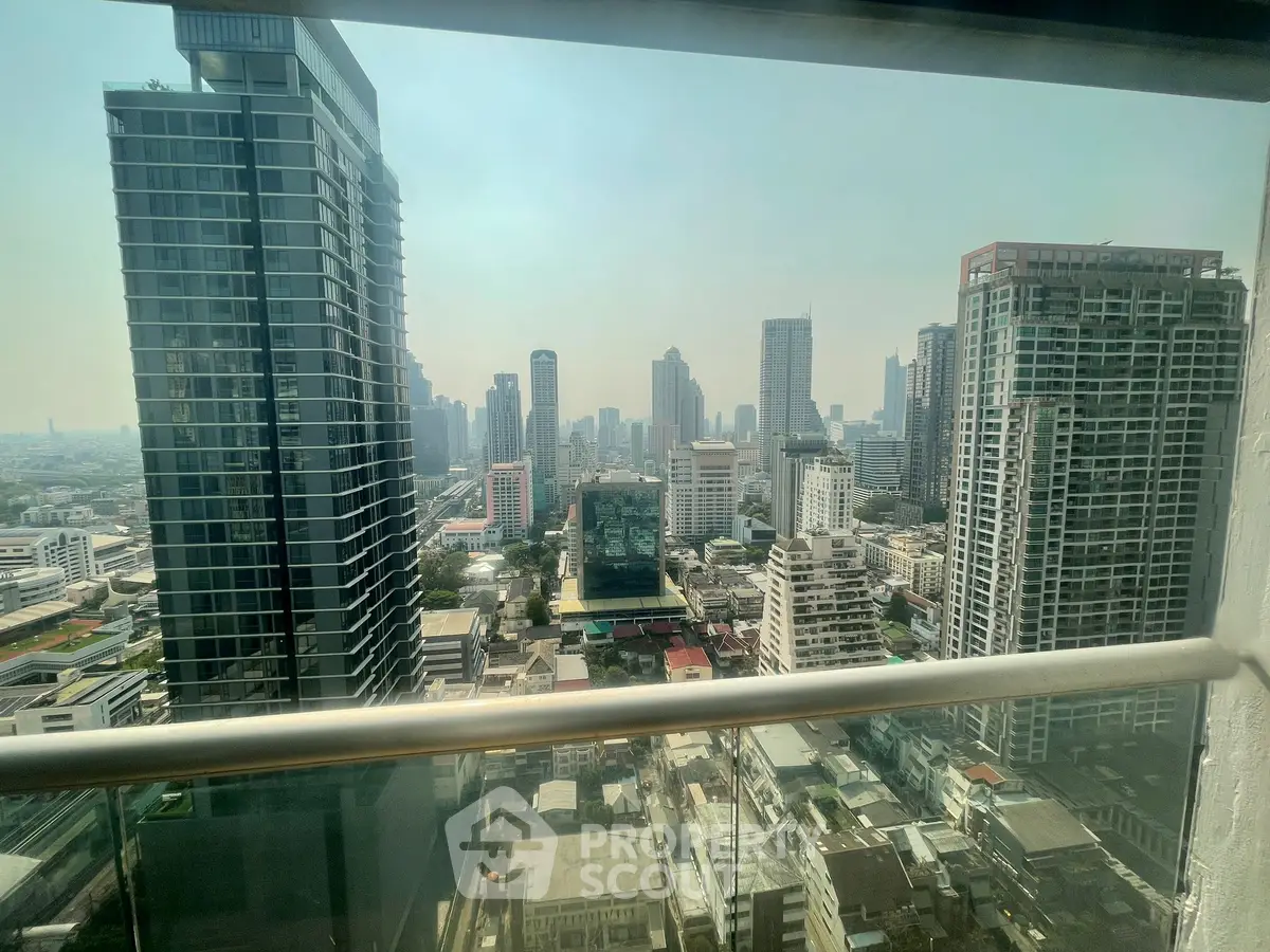Stunning cityscape view from high-rise balcony in urban skyline
