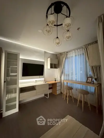 Modern living room with stylish lighting and cozy seating area