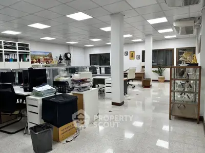 Spacious modern office space with sleek design and ample natural light