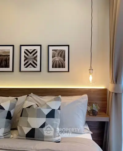 Modern bedroom with stylish decor and cozy lighting