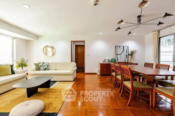 Spacious living room with elegant dining area and modern decor