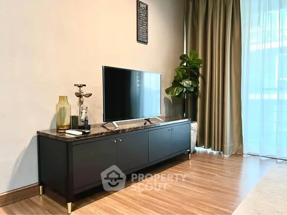 Modern living room with sleek TV stand and elegant decor