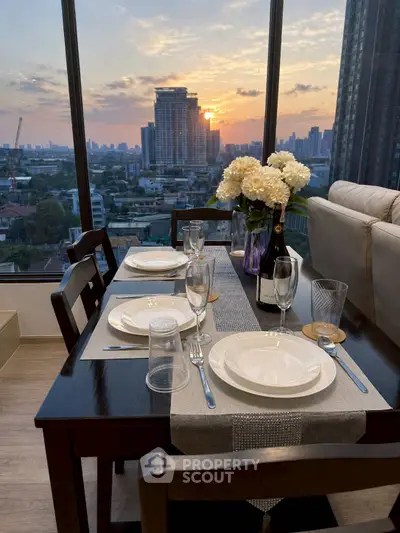 Luxurious dining area with stunning city view at sunset, perfect for elegant gatherings.