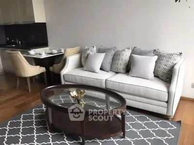 Modern living room with elegant sofa and dining area in open layout apartment