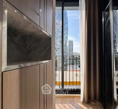 Modern apartment with stunning city view and sleek wooden interior design.