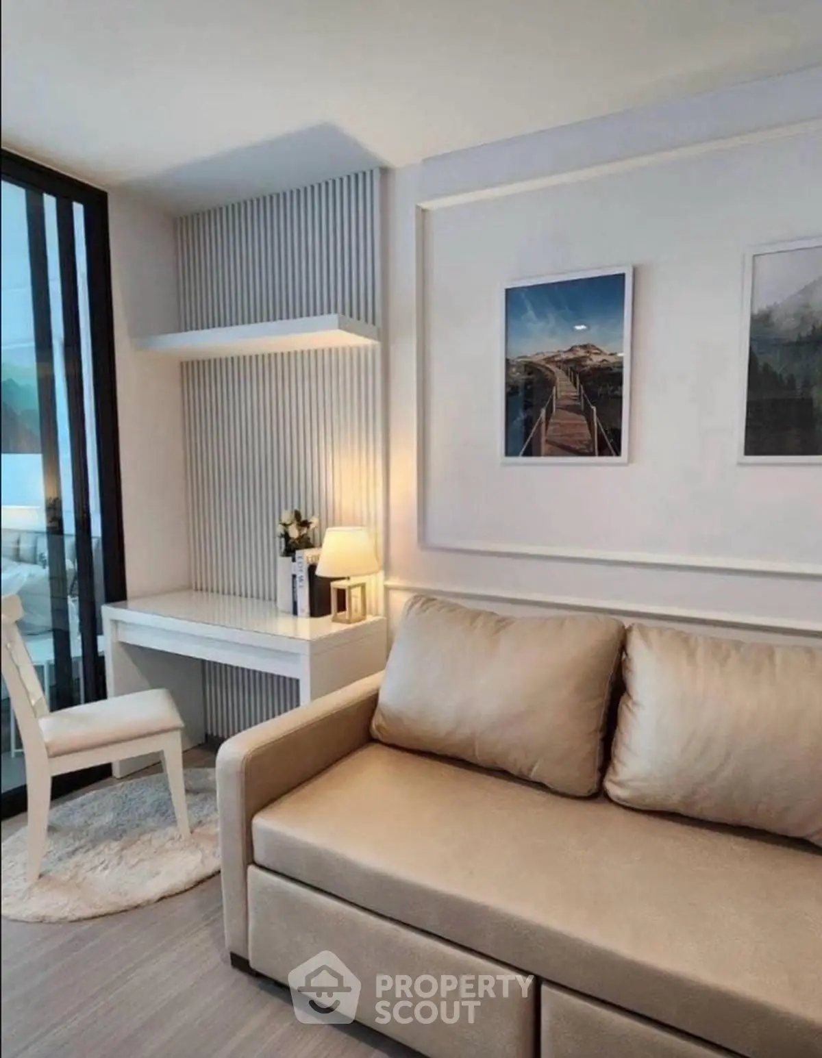 Modern living room with stylish decor and cozy sofa, perfect for relaxation and comfort.