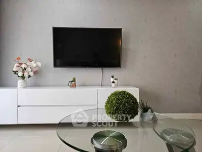 Modern living room with sleek TV setup and stylish decor