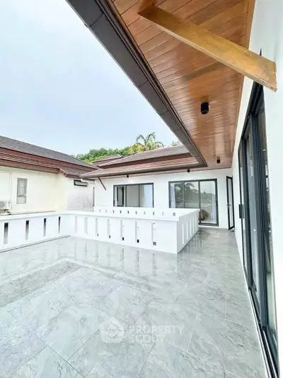 Spacious modern balcony with sleek design and elegant flooring
