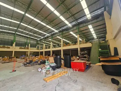 Spacious industrial warehouse with high ceilings and ample storage space
