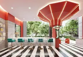 Modern coworking space with vibrant decor and lush greenery view