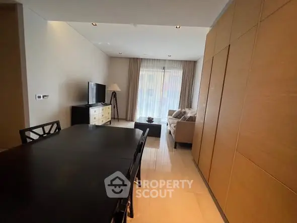 Spacious living room with modern furniture and natural light