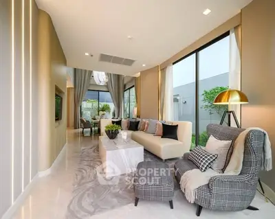 Luxurious modern living room with elegant decor and large windows