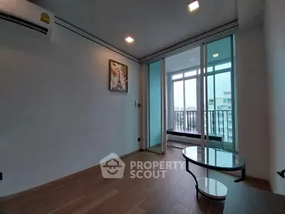 Modern living room with balcony view and stylish decor