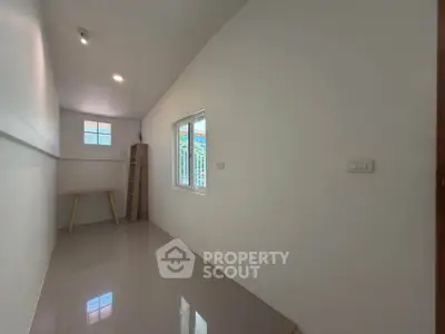 Minimalist study room with sleek design and natural light