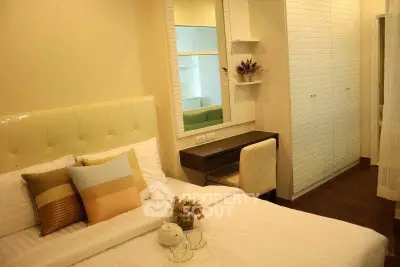 Cozy bedroom with elegant decor and ample storage space