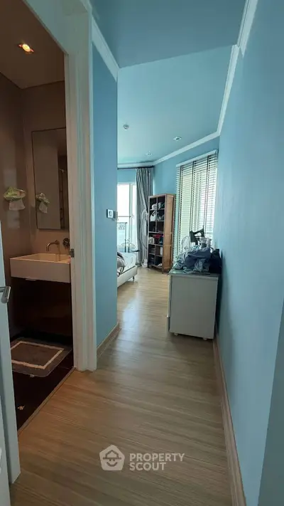 Charming bedroom with ensuite bathroom and natural light