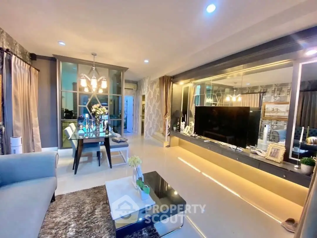 Modern living room with elegant decor and dining area