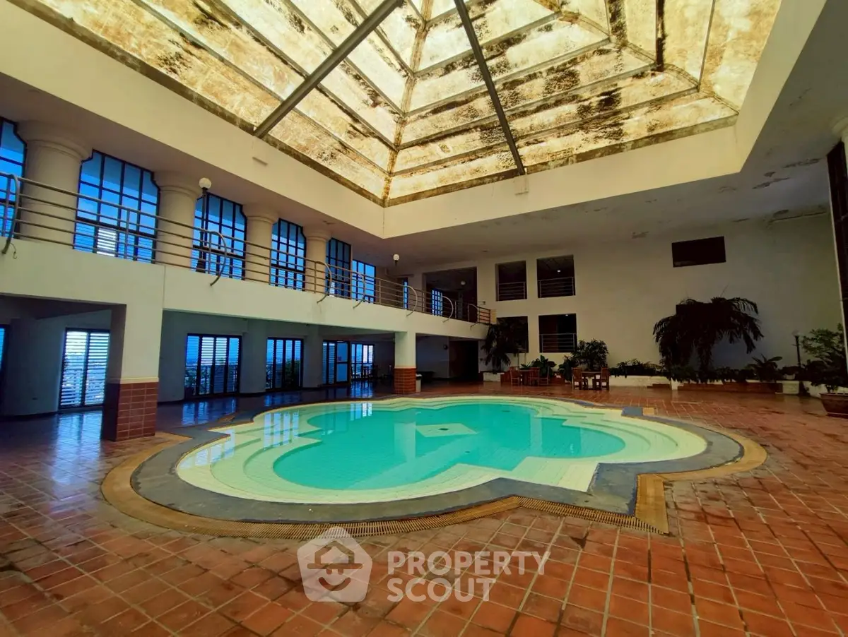 Luxurious indoor pool with skylight in elegant real estate property