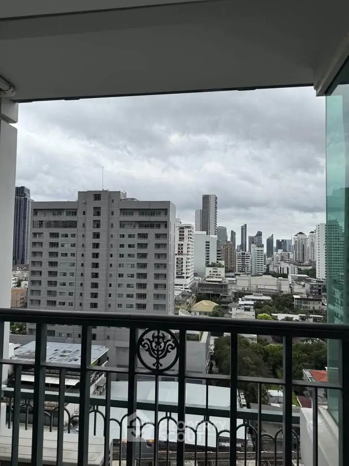 Stunning cityscape view from a high-rise balcony, perfect for urban living enthusiasts.