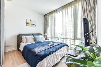 Modern bedroom with large windows and stylish decor in urban apartment