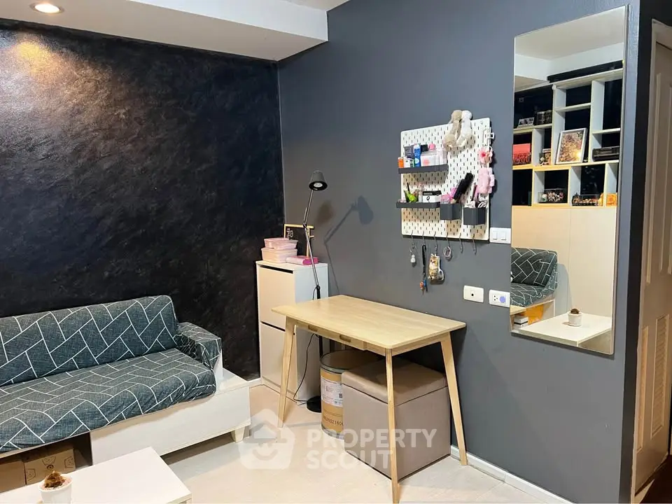 Cozy study area with modern decor and stylish furniture in a contemporary apartment.