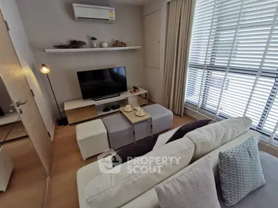 Modern living room with stylish decor and natural light