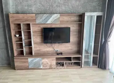 Modern living room with stylish wooden TV unit and elegant decor