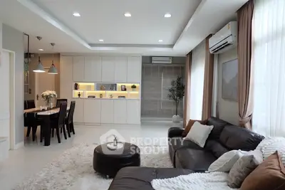 Spacious modern living room with elegant decor and cozy seating area