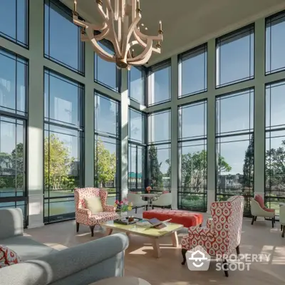 Luxurious living room with floor-to-ceiling windows and elegant decor