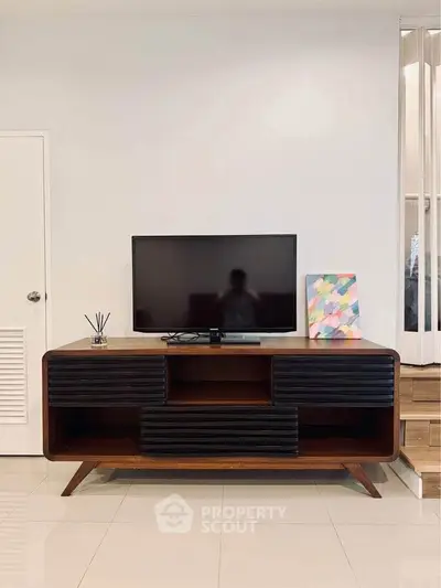 Stylish living room with modern TV stand and sleek decor