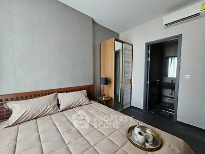 Modern bedroom with ensuite bathroom and stylish decor
