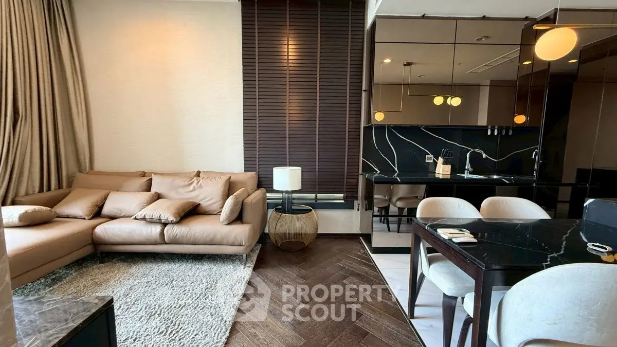 Luxurious modern living room with elegant decor and open kitchen layout