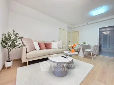 Modern living room with stylish decor and cozy seating area