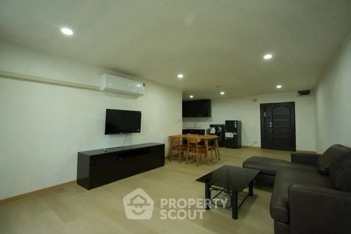 Spacious modern living room with sleek furniture and open layout