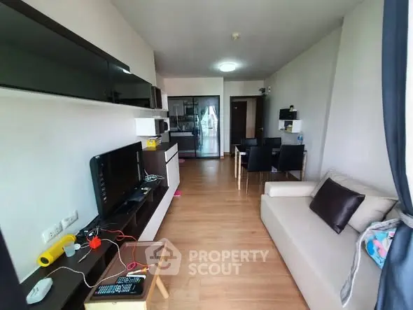Modern living room with sleek furniture and open layout, perfect for contemporary living.