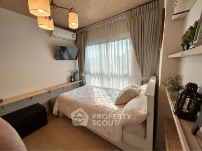 Cozy bedroom with natural light, modern decor, and wooden accents for a serene living experience.