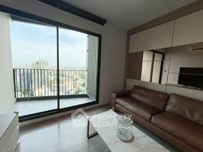 Modern living room with leather sofa and city view balcony in high-rise apartment.