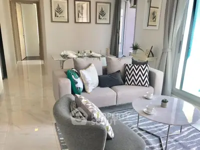 Stylish modern living room with elegant decor and cozy seating area.