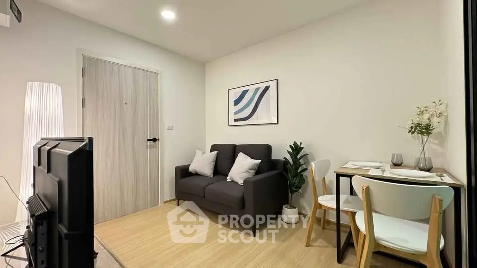 Cozy modern living room with stylish decor and dining area