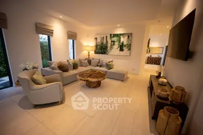 Luxurious living room with modern decor and cozy seating area, perfect for relaxation and entertainment.