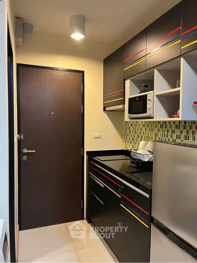 Modern kitchen with sleek cabinets and stylish backsplash