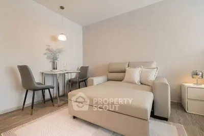 Modern living room with stylish furniture and elegant decor, perfect for cozy relaxation.