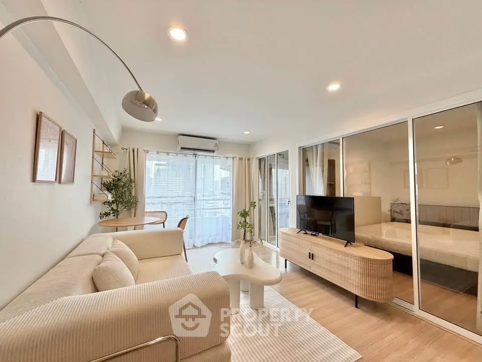 Spacious modern living room with elegant decor and natural light