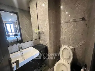 Modern bathroom with sleek marble design and contemporary fixtures