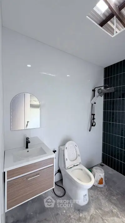 Modern bathroom with sleek fixtures and stylish shower area