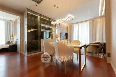 Luxurious modern dining area with elegant lighting and open layout in a stylish apartment.